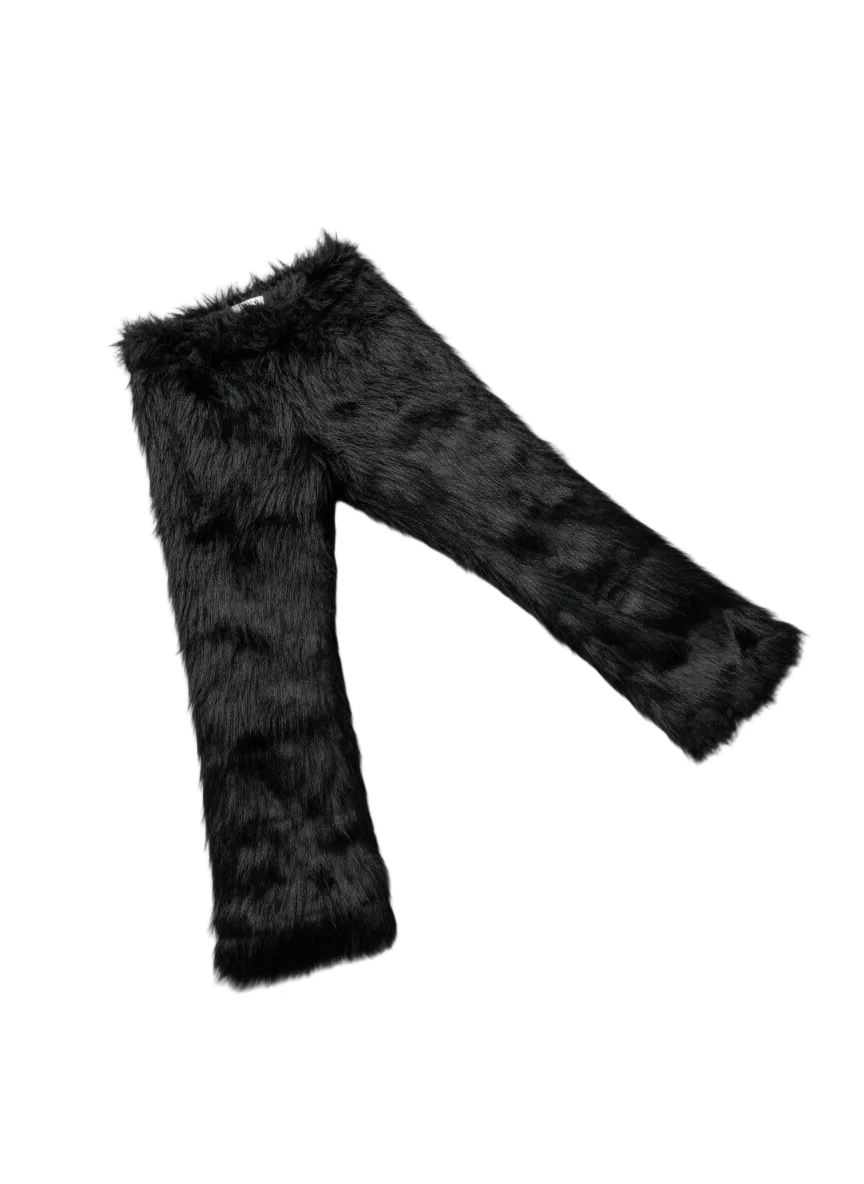 A pair of noir pelt trousers made of vegan fur with a high waist and lined with satin silk